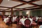 Commodore Nile Cruise indoor restaurant with dining setup